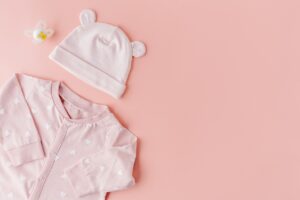 baby clothes, flat lay, copy space